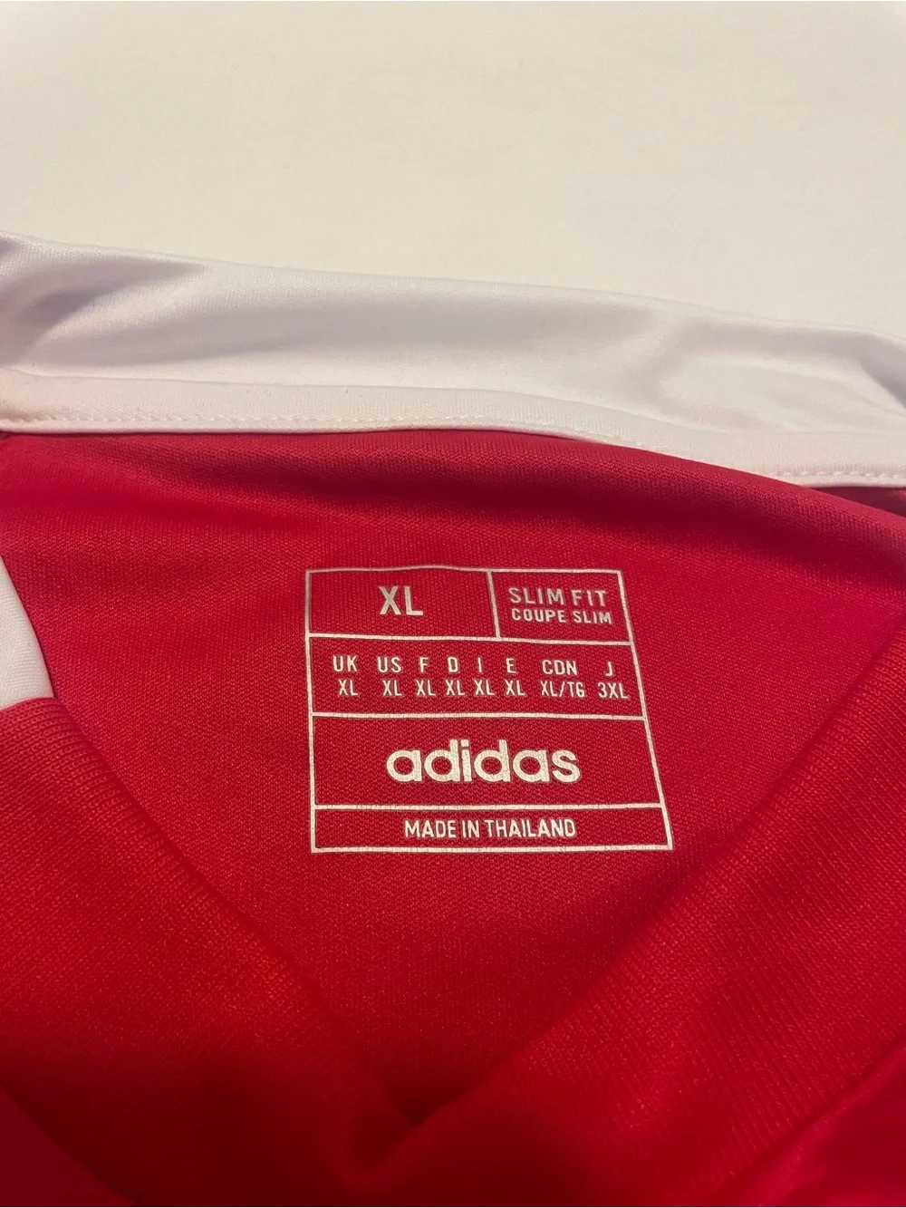 Adidas Red and White Arsenal Football Jersey with navy accents.